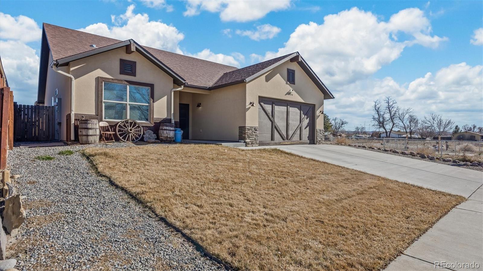 556-32 32 5/8 Road Clifton, CO 81520 - Photo 3 of 28 a view of a house with a outdoor space
