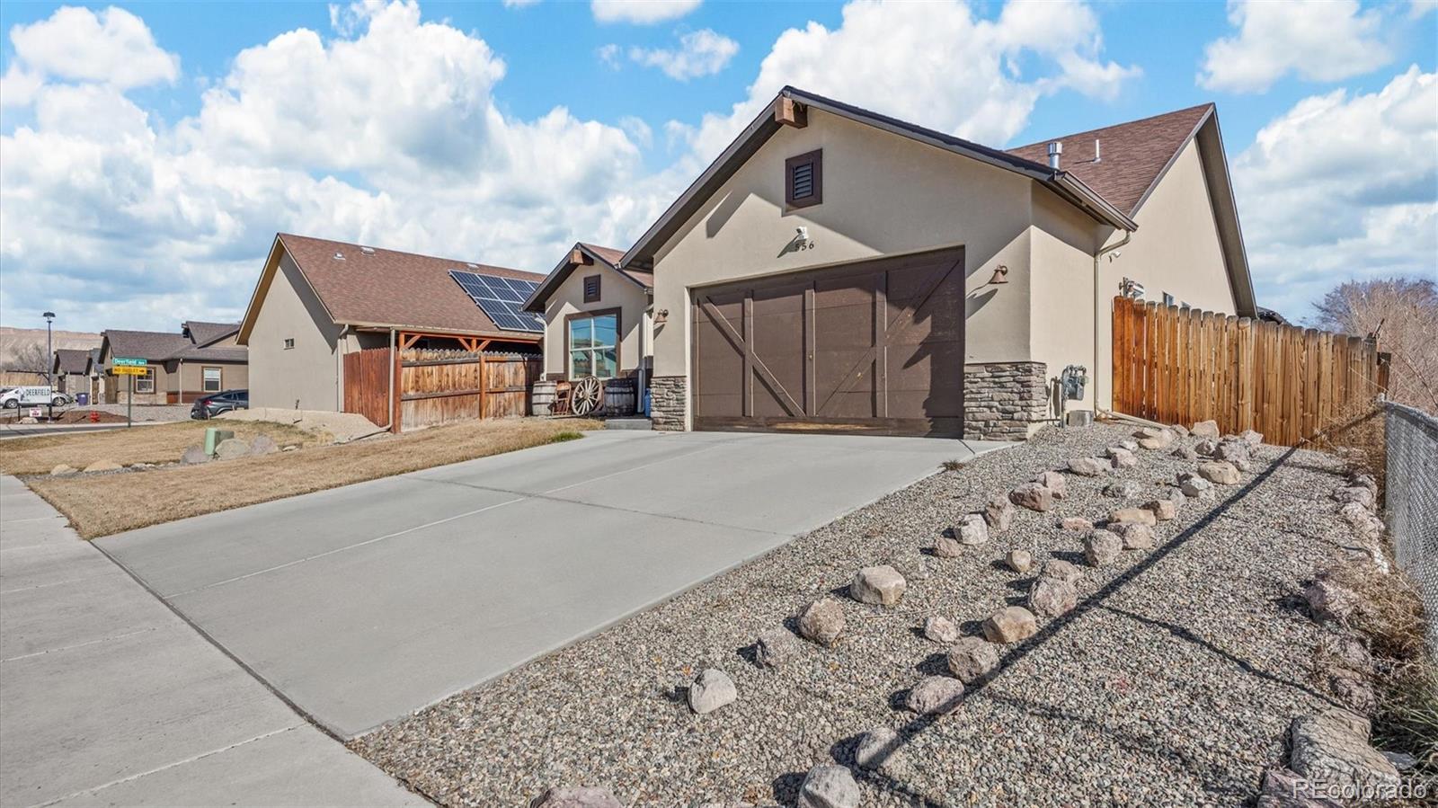 556-32 32 5/8 Road Clifton, CO 81520 - Photo 4 of 28 a view of a house with wooden fence
