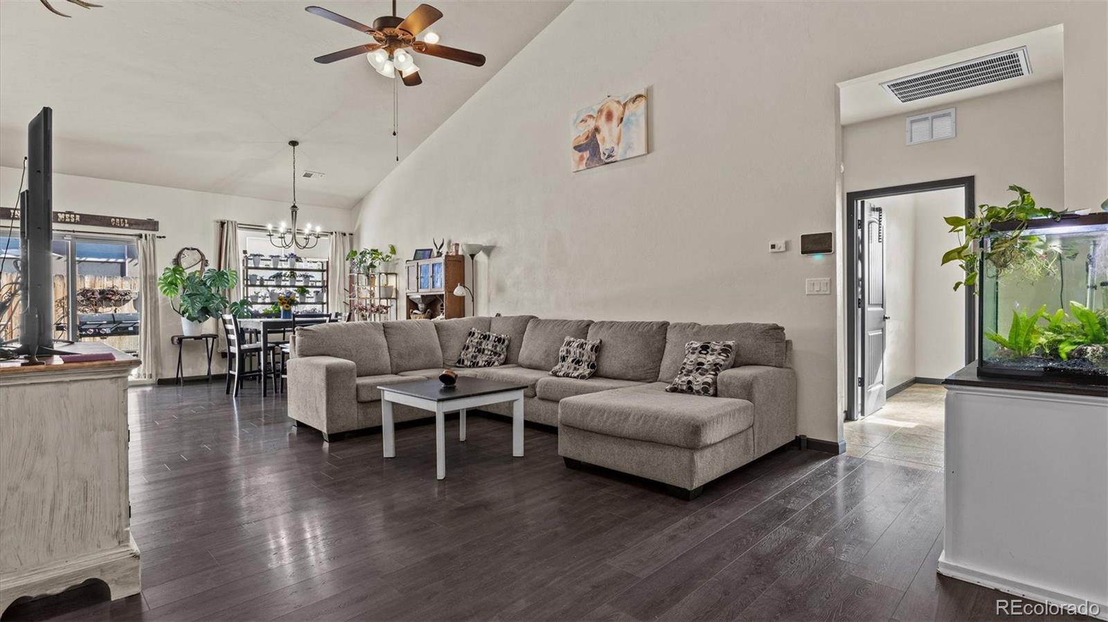 556-32 32 5/8 Road Clifton, CO 81520 - Photo 8 of 28 a living room with furniture and wooden floor