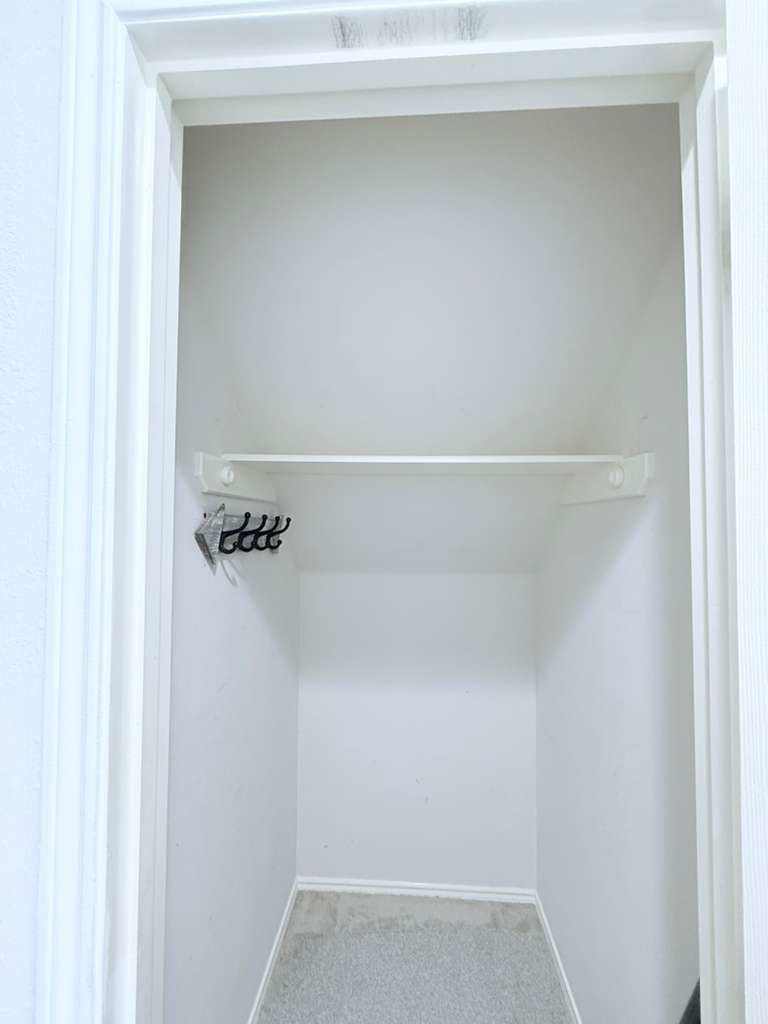 1011 Backland Court Spring, TX 77373 - Photo 20 of 35 a view of small space with racks on the wall