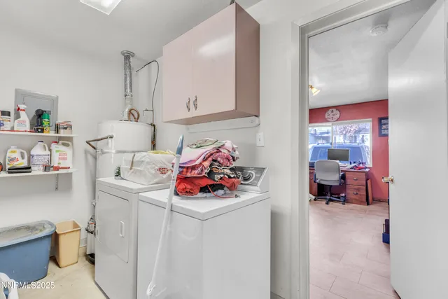 a storage room with washer and dryer