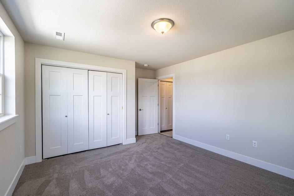 455 Hillary Circle, Unit B Johnson Creek, WI 53038 - Photo 18 of 21 Bedroom 3