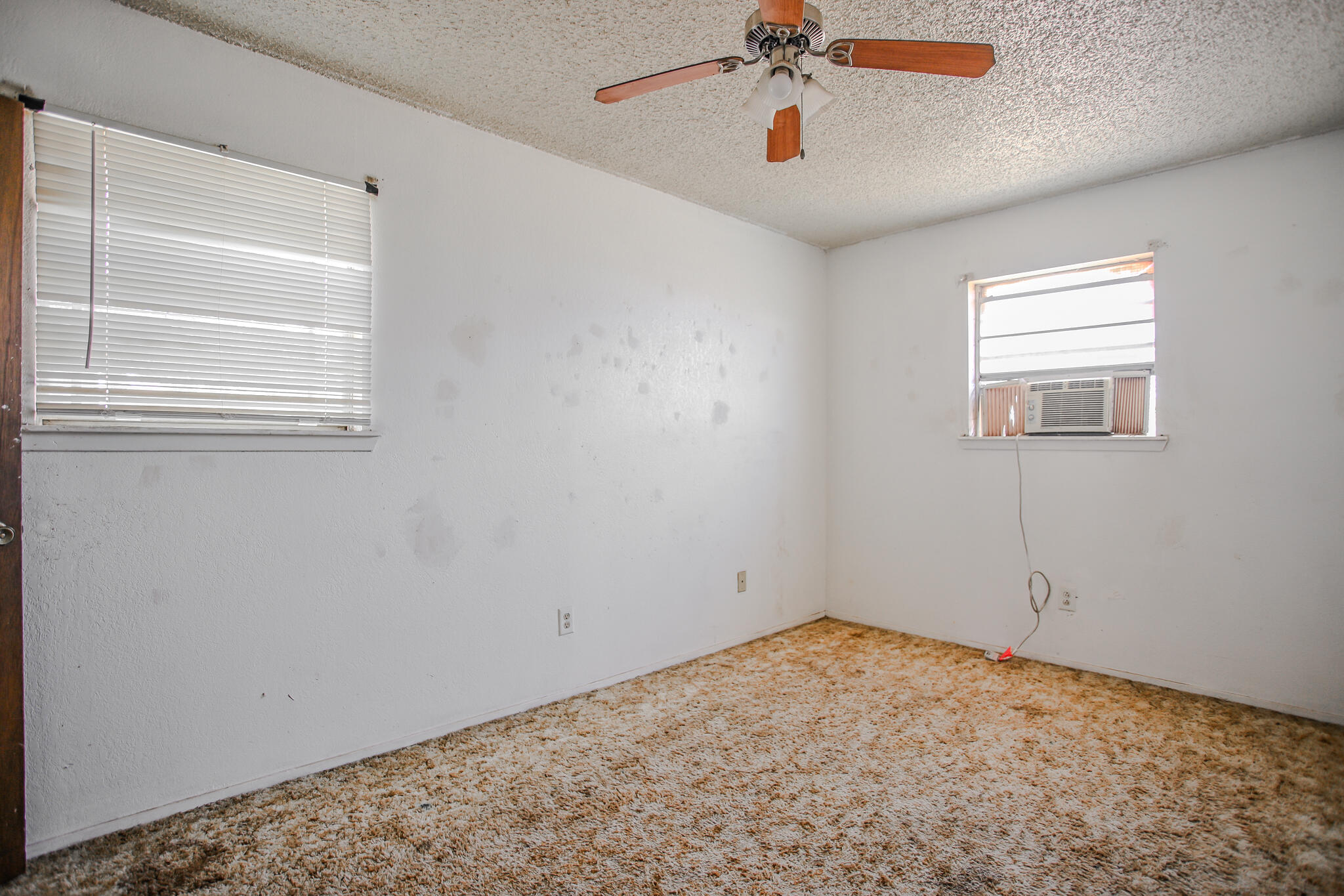 2620 Amherst Street Lubbock, TX 79415 - Photo 18 of 22 a view of empty room with ceiling fan