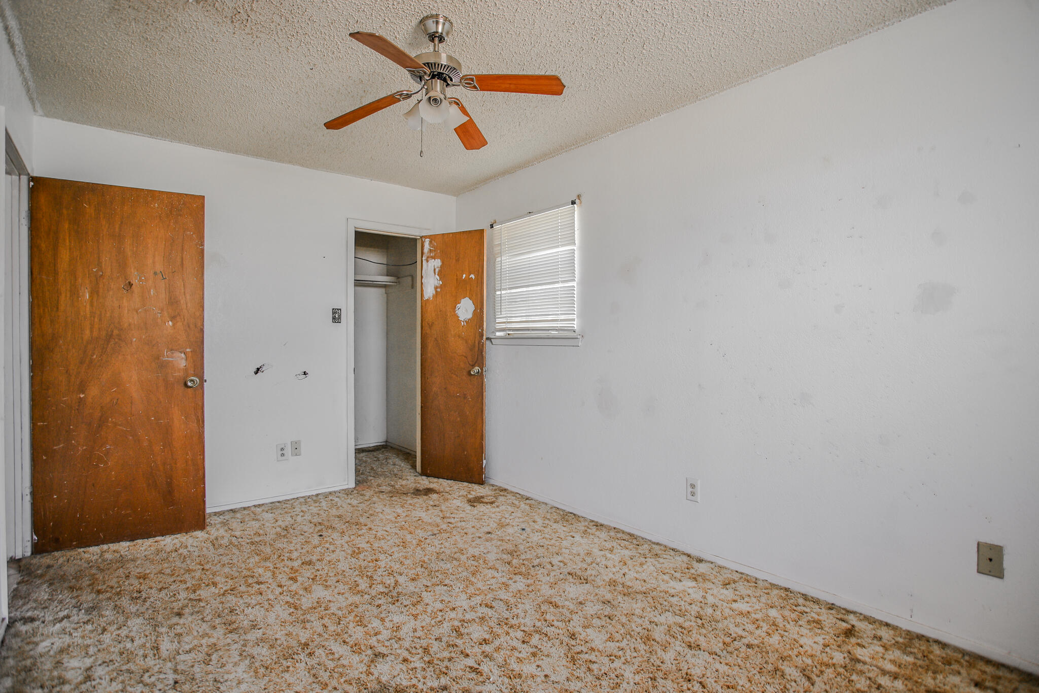 2620 Amherst Street Lubbock, TX 79415 - Photo 19 of 22 a view of a livingroom with a chandelier fan