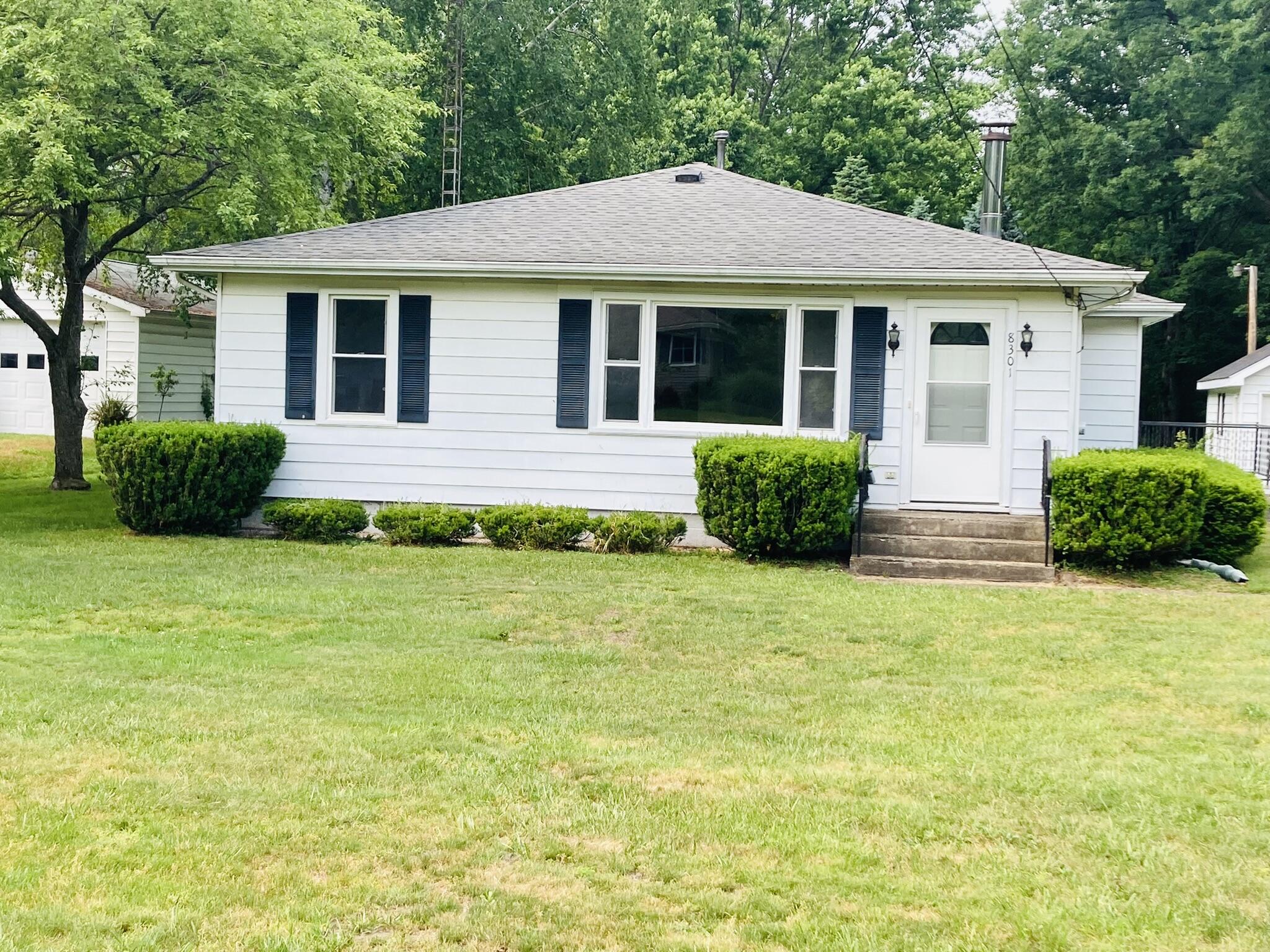 8301 West East Road Three Oaks, MI 49128 - Photo 1 of 33 Front of Home