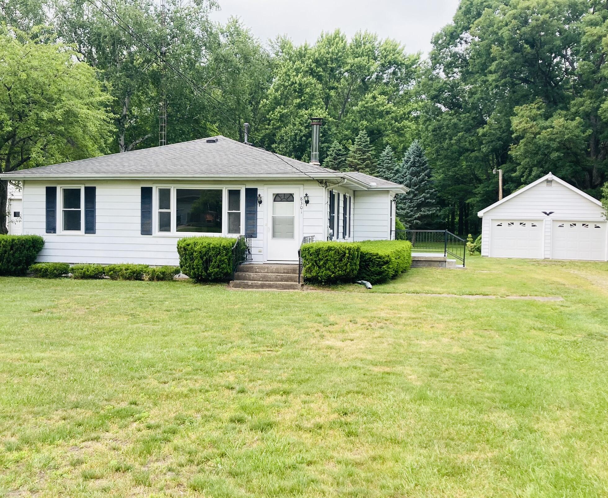 8301 West East Road Three Oaks, MI 49128 - Photo 2 of 33 Front of Home