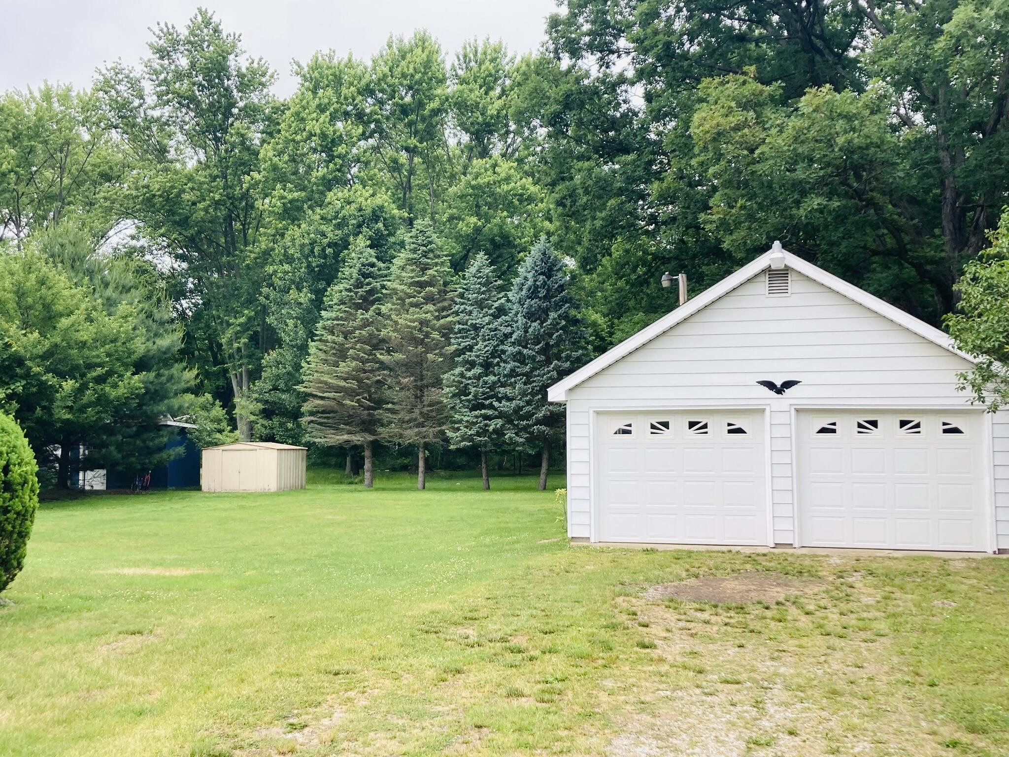 8301 West East Road Three Oaks, MI 49128 - Photo 29 of 33 2 Car Garage & Back Yard