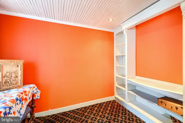 a view of bedroom with a large window