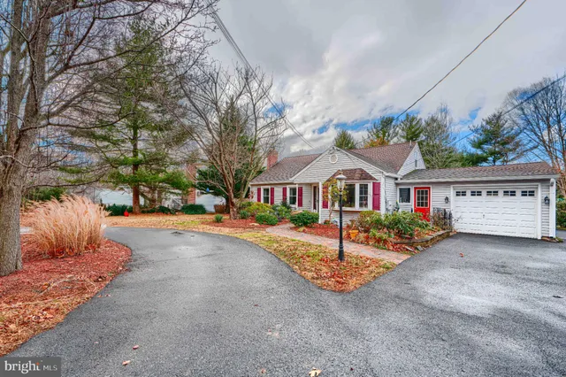 a view of street with parked cars