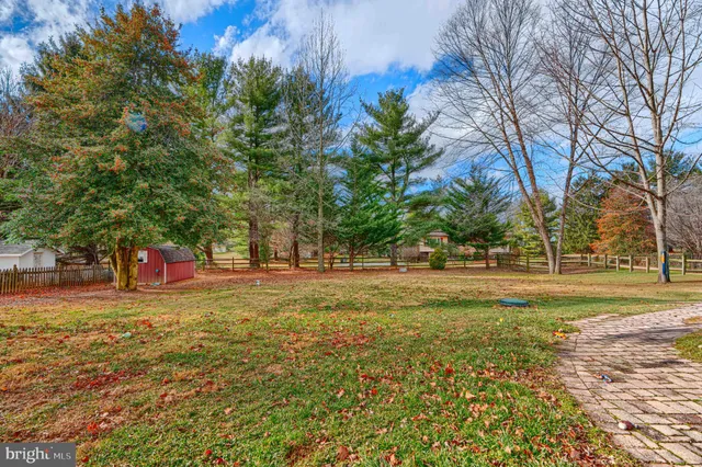a view of a playground with basketball court
