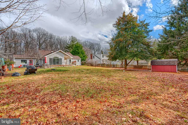 a view of house with outdoor space