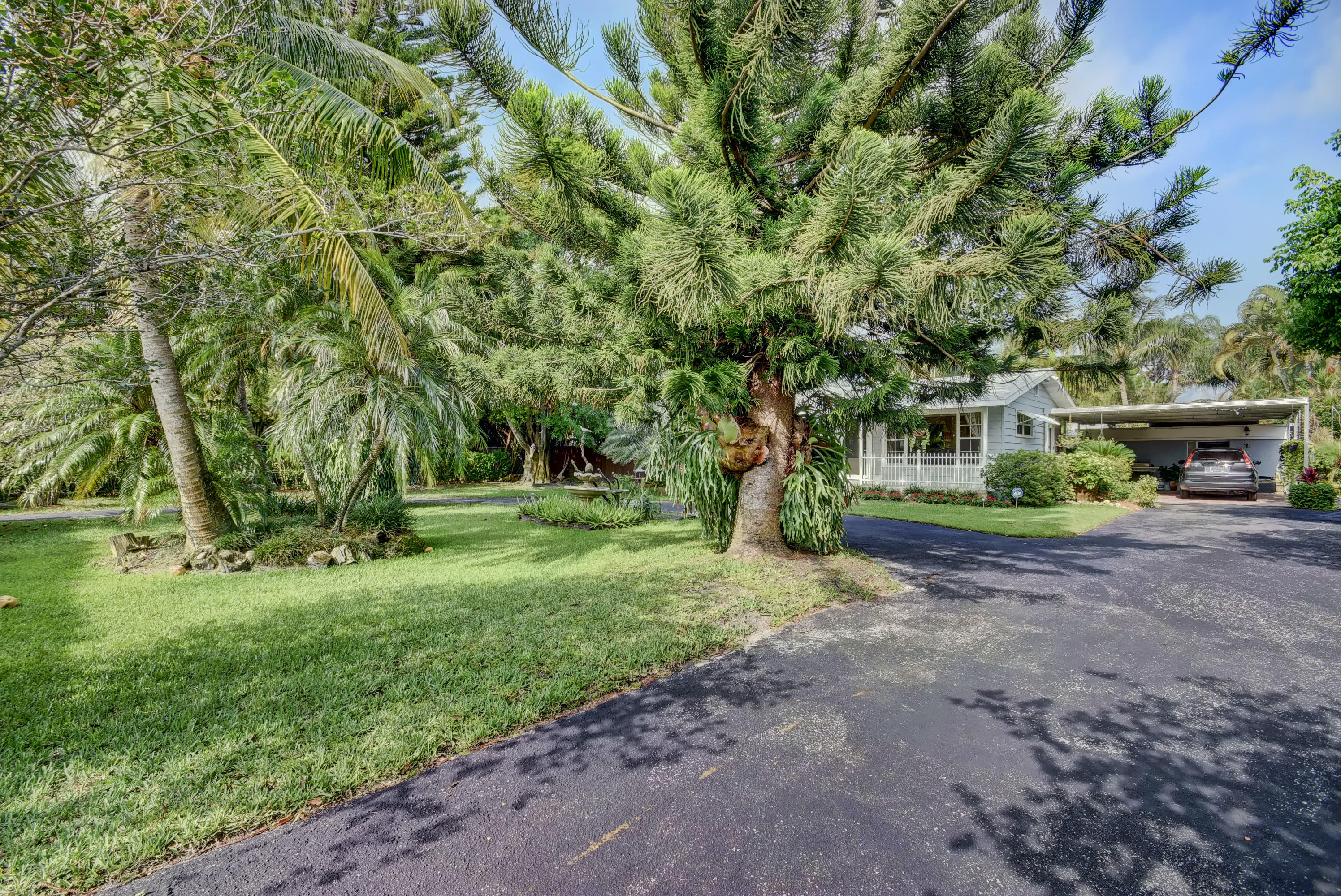 2143 Bermuda Road Palm Springs, FL 33406 - Photo 48 of 54 driveway