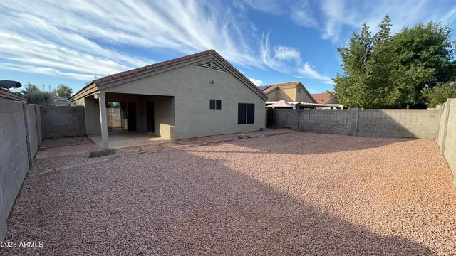 a view of backyard of house
