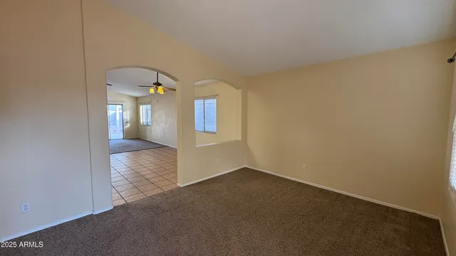 an empty room with a mirror