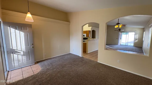 a view of a living room with windows