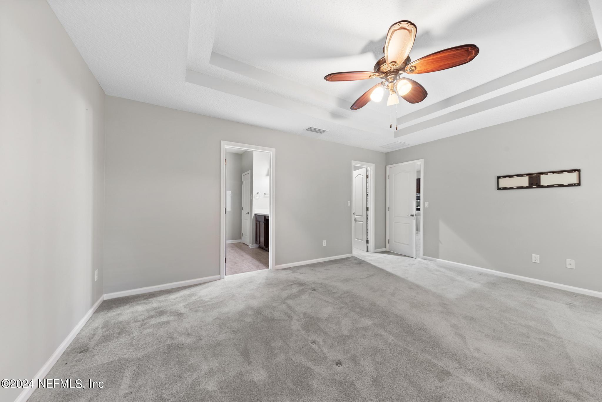 86192 Fortune Drive Yulee, FL 32097 - Photo 14 of 26 a view of room with a ceiling fan