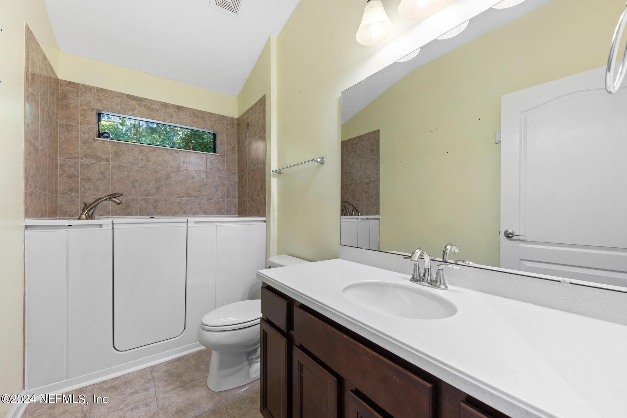 86192 Fortune Drive Yulee, FL 32097 - Photo 18 of 26 a bathroom with a sink and a toilet