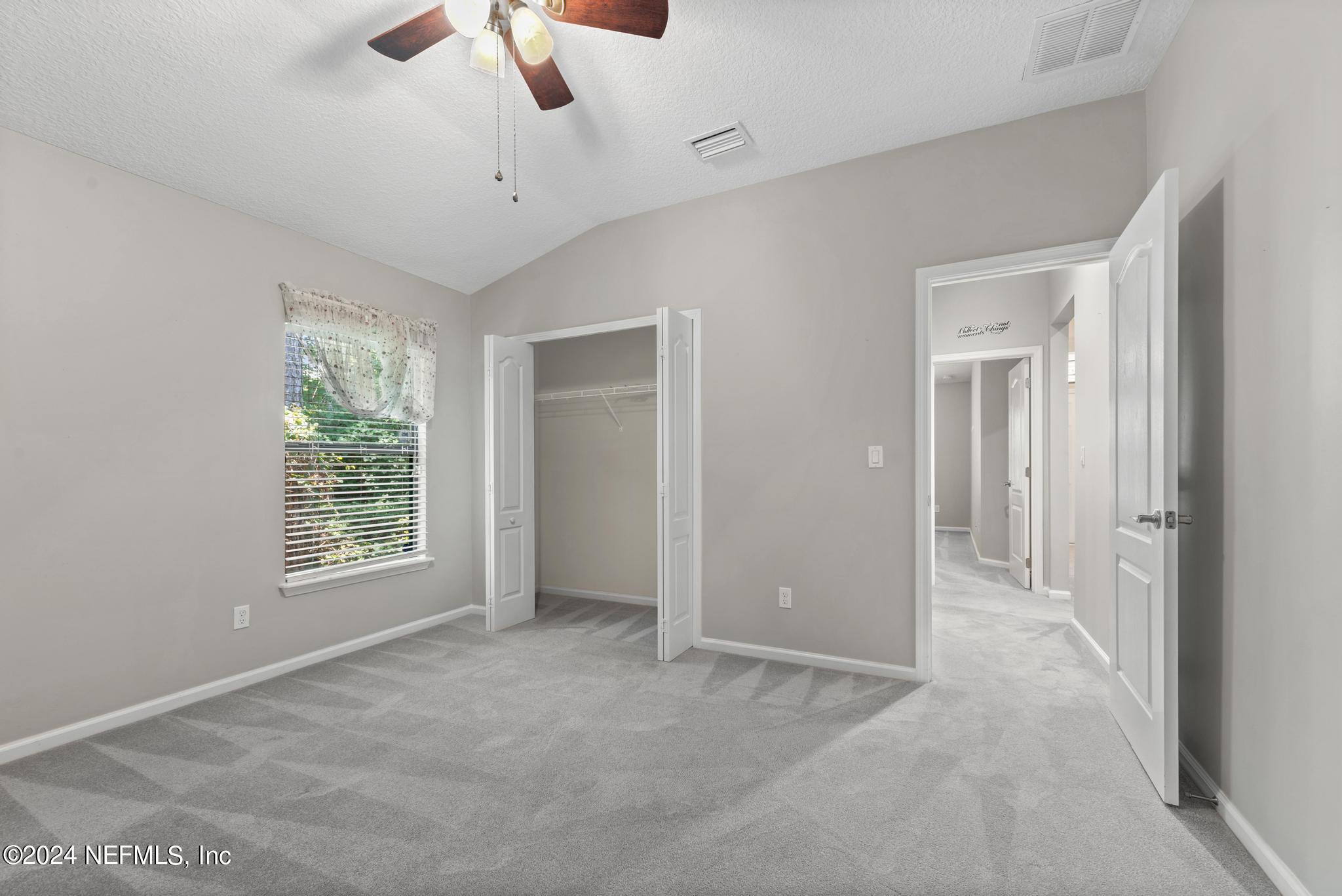 86192 Fortune Drive Yulee, FL 32097 - Photo 19 of 26 a view of an empty room with a window
