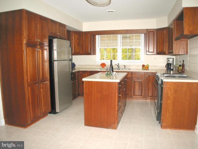 16531 Batchellors Forest Road Olney, MD 20832 - Photo 6 of 30 Island Kitchen with Stainless Steel Appliances