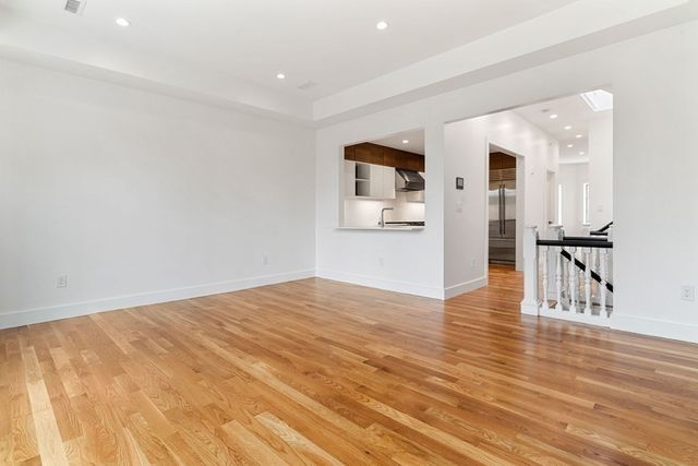 a view of a livingroom with wooden floor