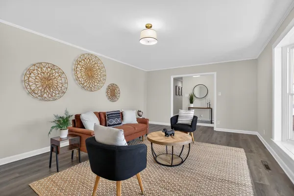 a open kitchen with stainless steel appliances granite countertop a lot of counter space and wooden floors