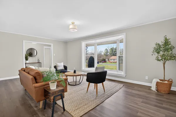 a kitchen with stainless steel appliances granite countertop a refrigerator and a stove