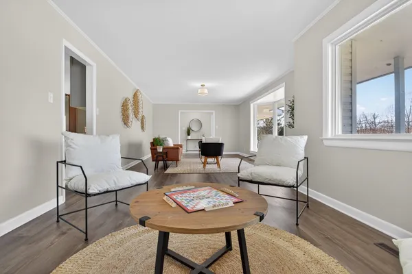 a bedroom with a bed and a mirror