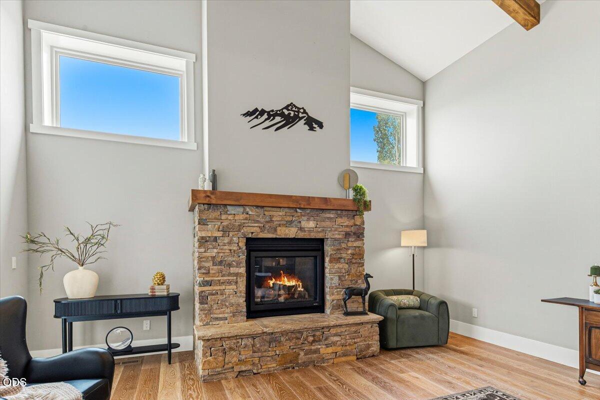 61333 Kindle Rock Loop Bend, OR 97702 - Photo 25 of 53 a living room with furniture and a fireplace