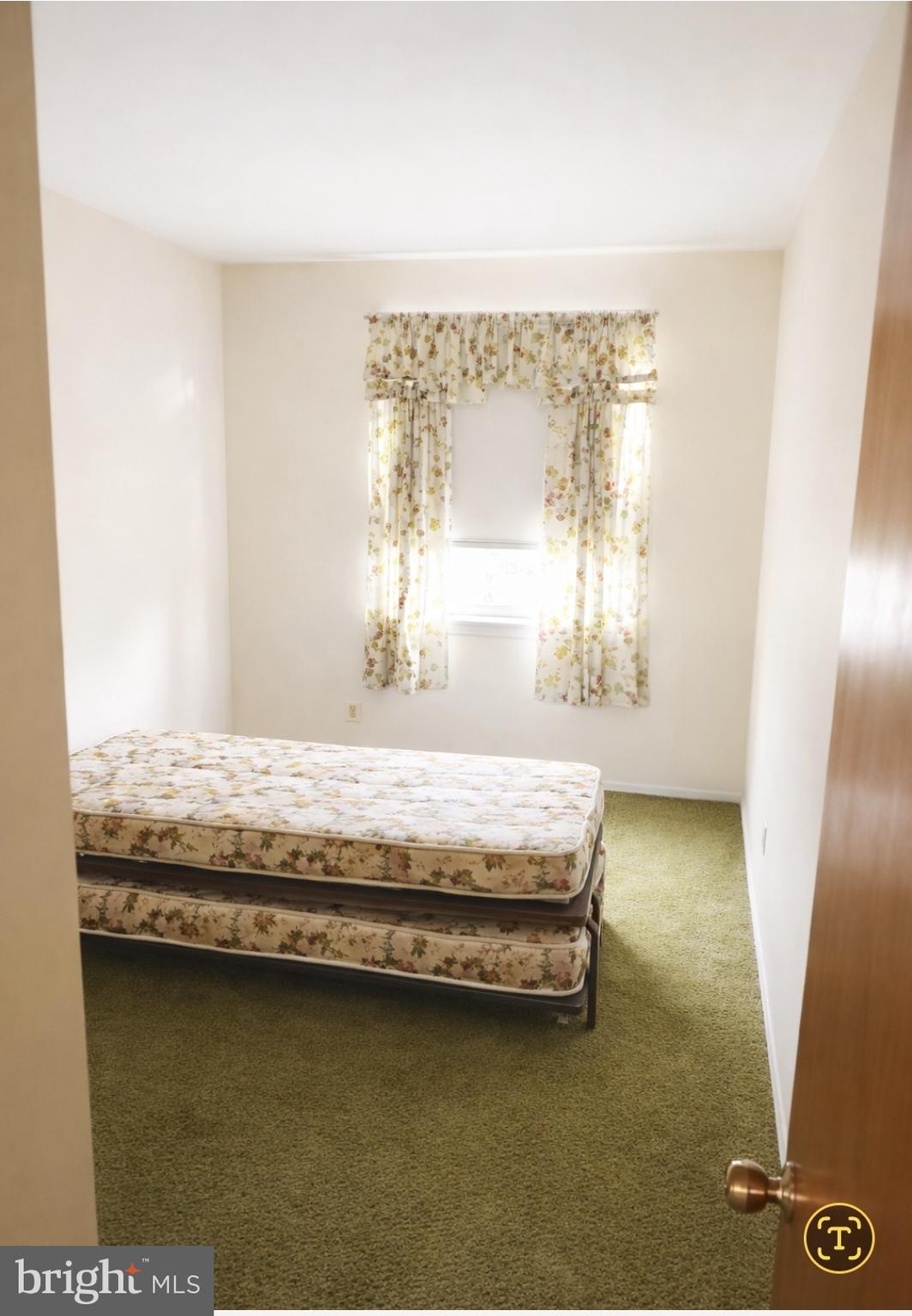 3230 Comly Road Philadelphia, PA 19154 - Photo 23 of 29 a bedroom with a bed and a window