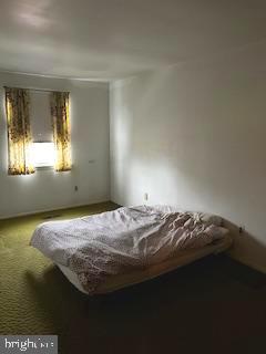 3230 Comly Road Philadelphia, PA 19154 - Photo 25 of 29 a bed sitting in a spacious bedroom next to a window
