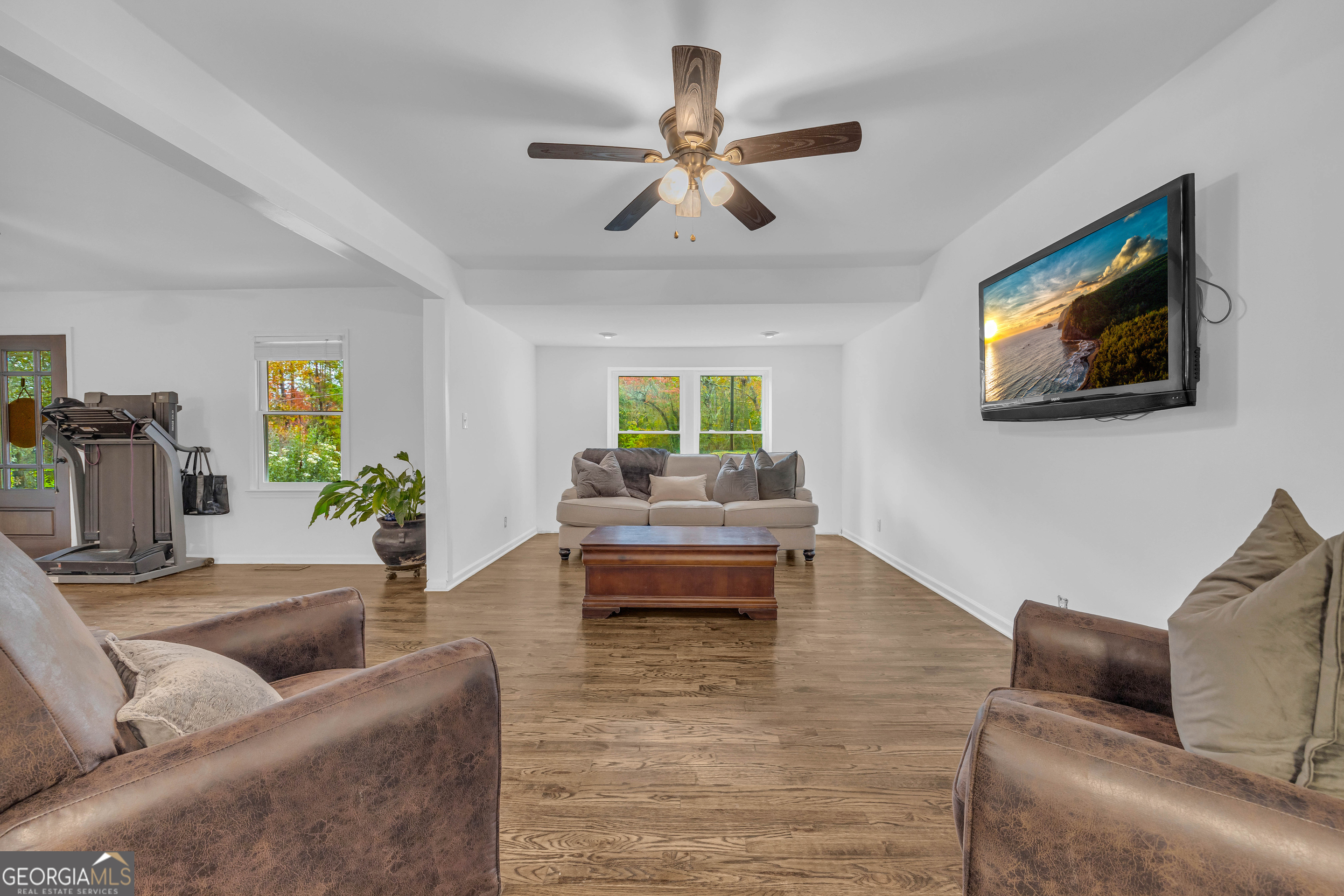 619 Watson Street Toccoa, GA 30577 - Photo 13 of 28 a living room with furniture and a wooden floor