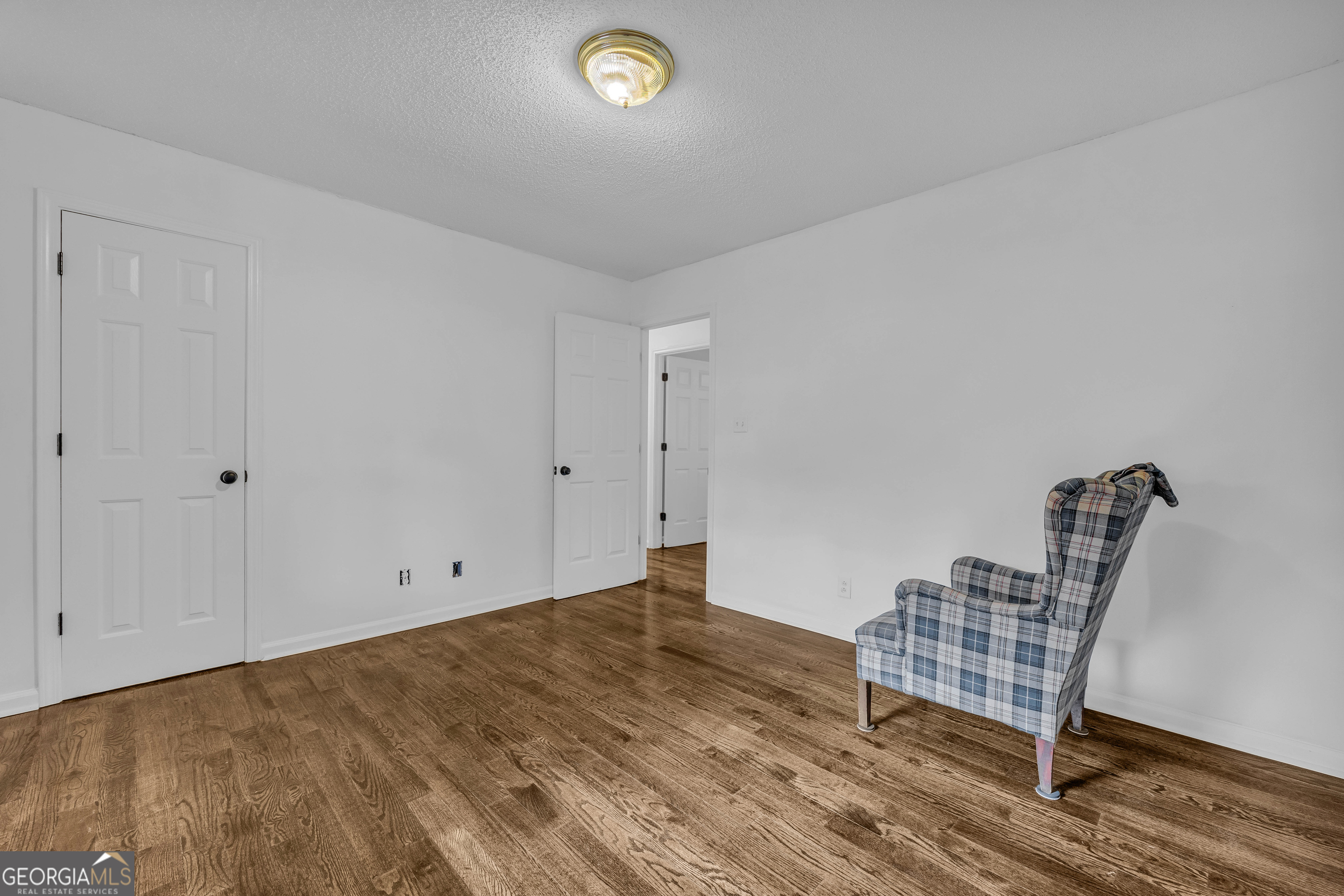 619 Watson Street Toccoa, GA 30577 - Photo 28 of 28 a view of an empty room with wooden floor