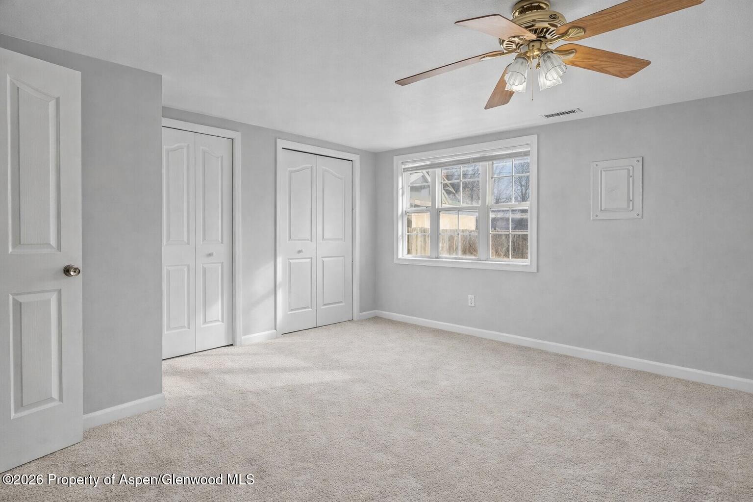 109 East 12th Street Rifle, CO 81650 - Photo 20 of 31 a view of an empty room with a window