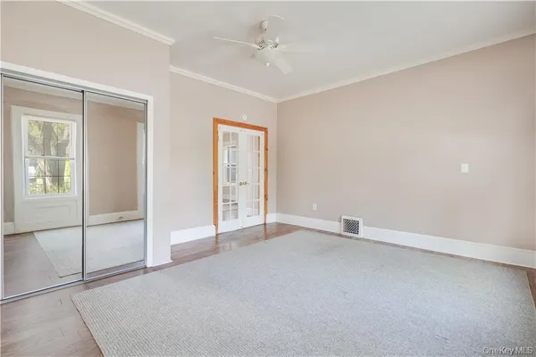 an empty room with fan