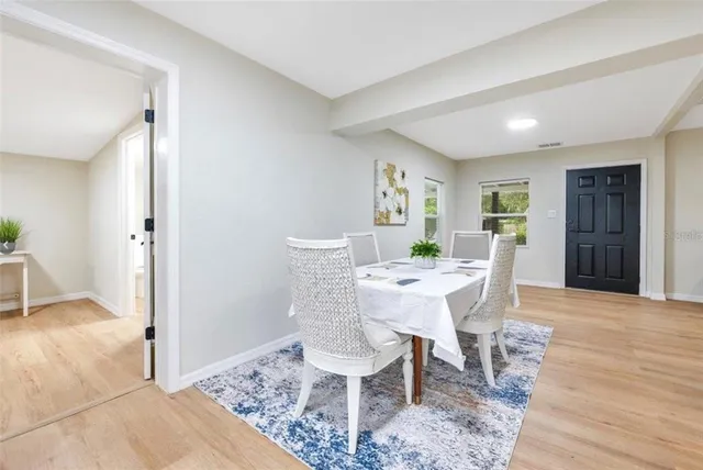 a view of a dining room with furniture