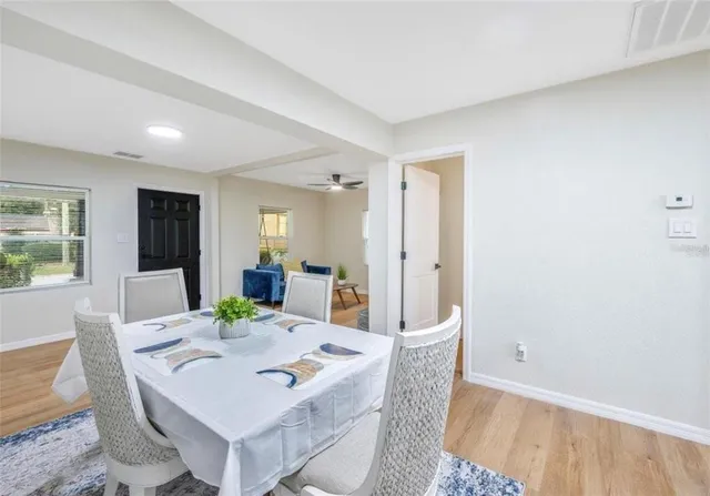 a view of a dining room with furniture