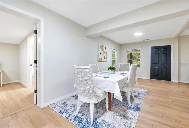 a view of a dining room with furniture