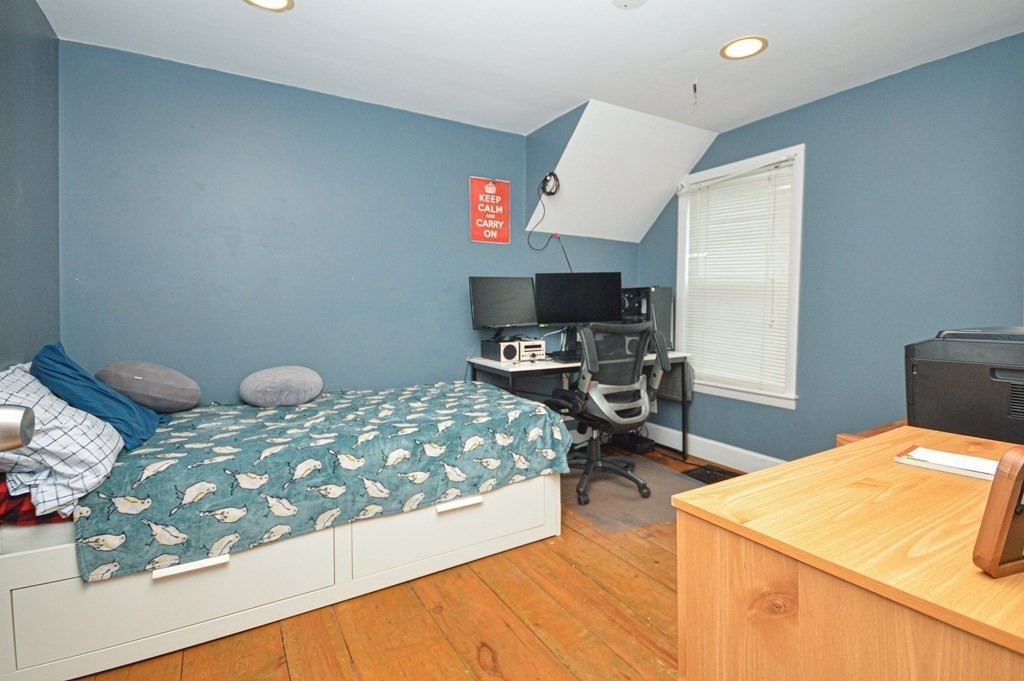 21 Carnes Street Lynn, MA 01905 - Photo 12 of 20 a bedroom with bed and a window
