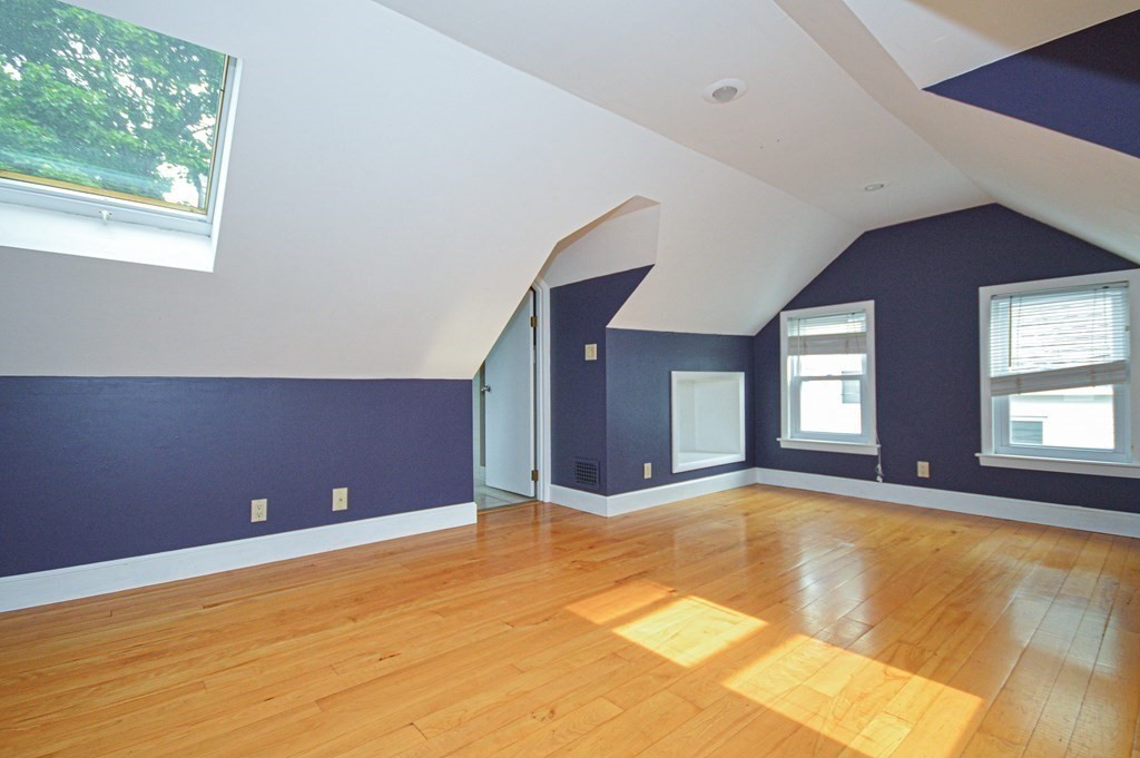 21 Carnes Street Lynn, MA 01905 - Photo 6 of 20 a view of an empty room with window
