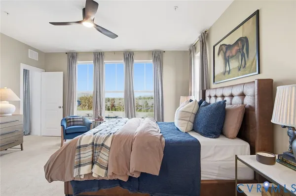 a bedroom with bed and window