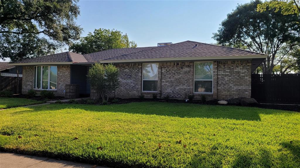13124 Kerr Trail Farmers Branch, TX 75244 - Photo 2 of 30 a view of a house with garden and yard