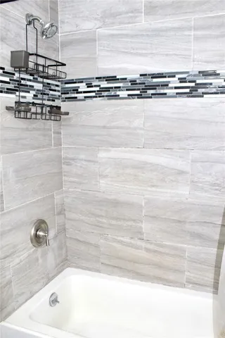 a bathroom with a bathtub