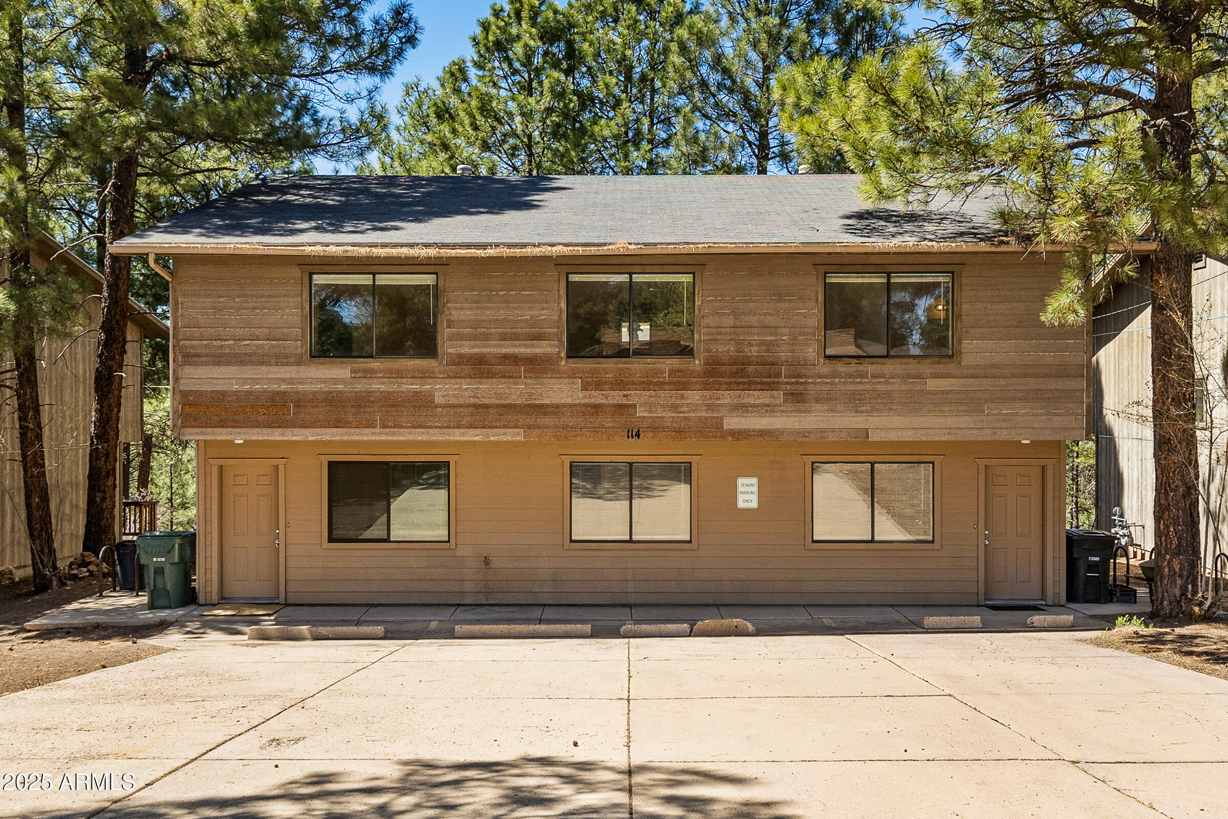 108 East Paseo Del Rio Flagstaff, AZ 86001 - Photo 3 of 26 a front view of a house with garage