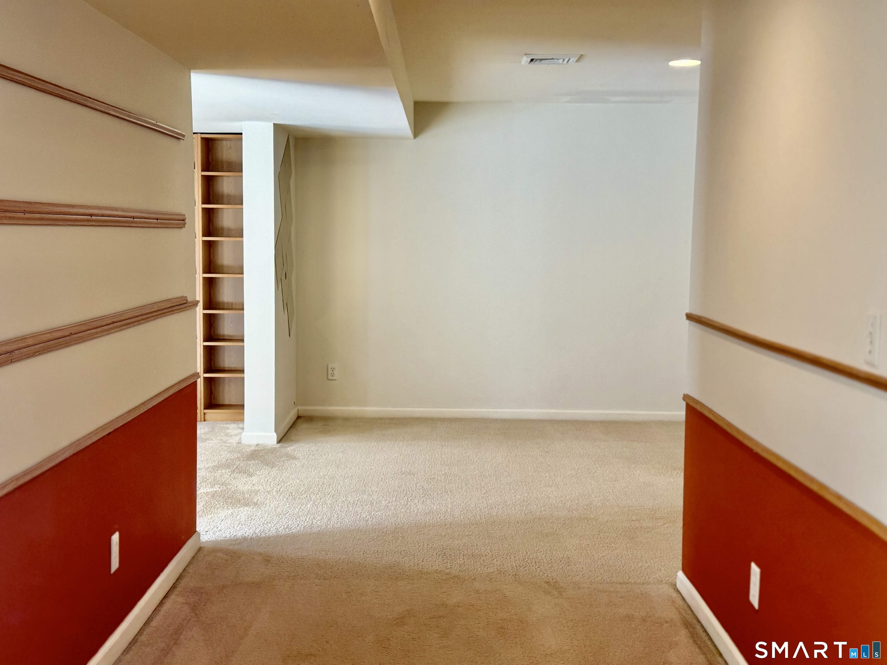3 Brookside Drive, Unit 3 Middlebury, CT 06762 - Photo 29 of 38 a view of walk in closet with clothes and window