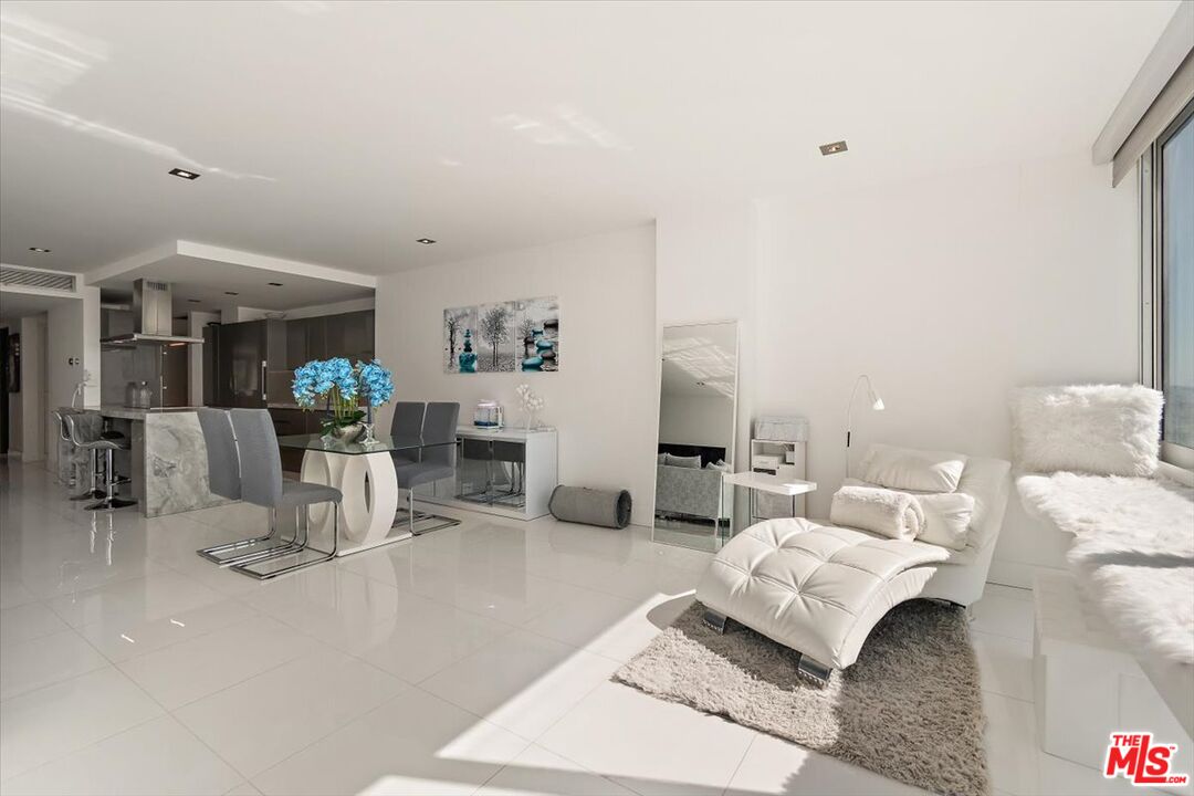 2222 Avenue Of The Stars, Unit 1203 Los Angeles, CA 90067 - Photo 34 of 43 a living room with furniture and a table
