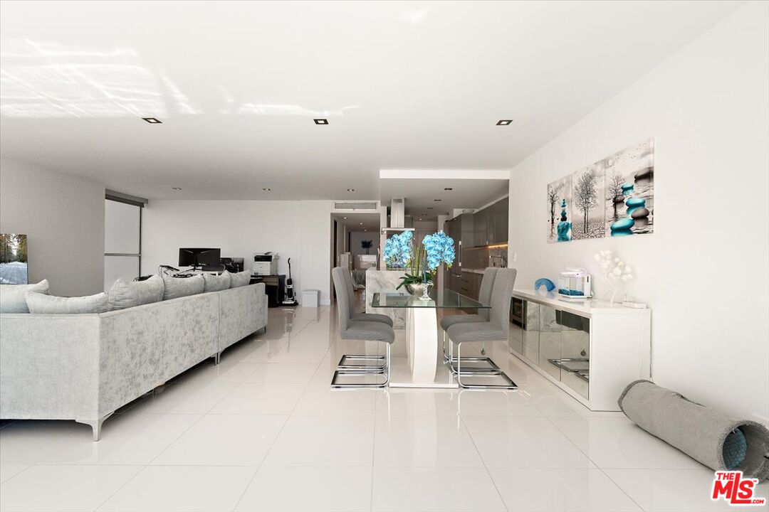 2222 Avenue Of The Stars, Unit 1203 Los Angeles, CA 90067 - Photo 36 of 43 a living room with furniture and a table