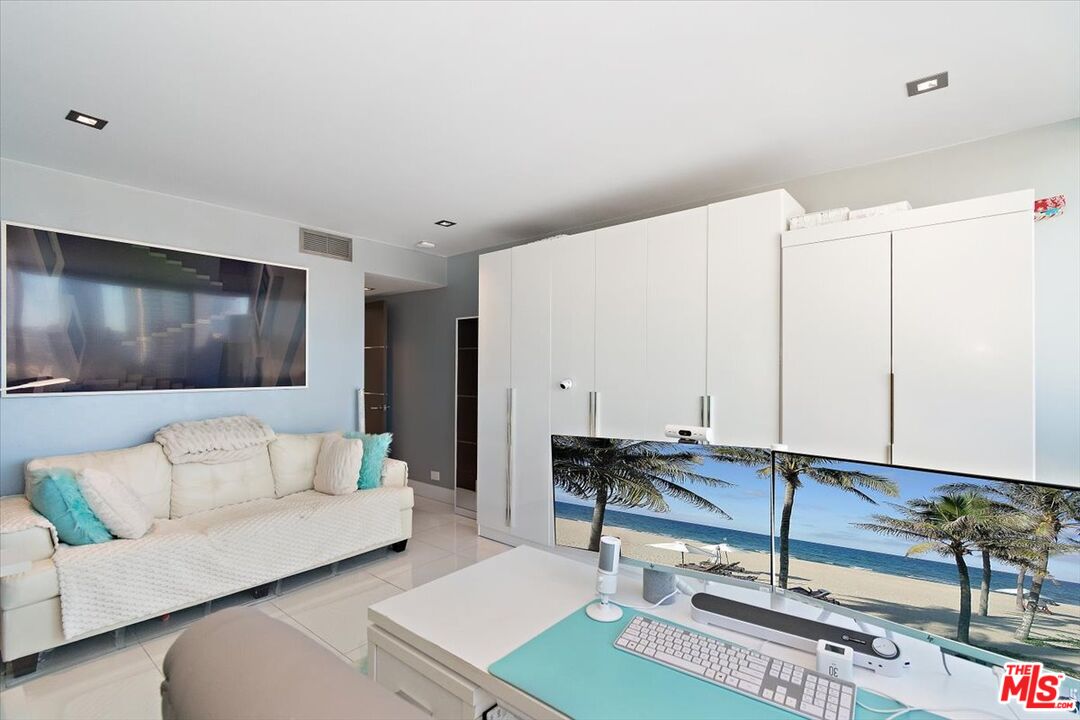 2222 Avenue Of The Stars, Unit 1203 Los Angeles, CA 90067 - Photo 37 of 43 a living room with furniture and a couch