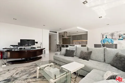 a living room with furniture and a couch