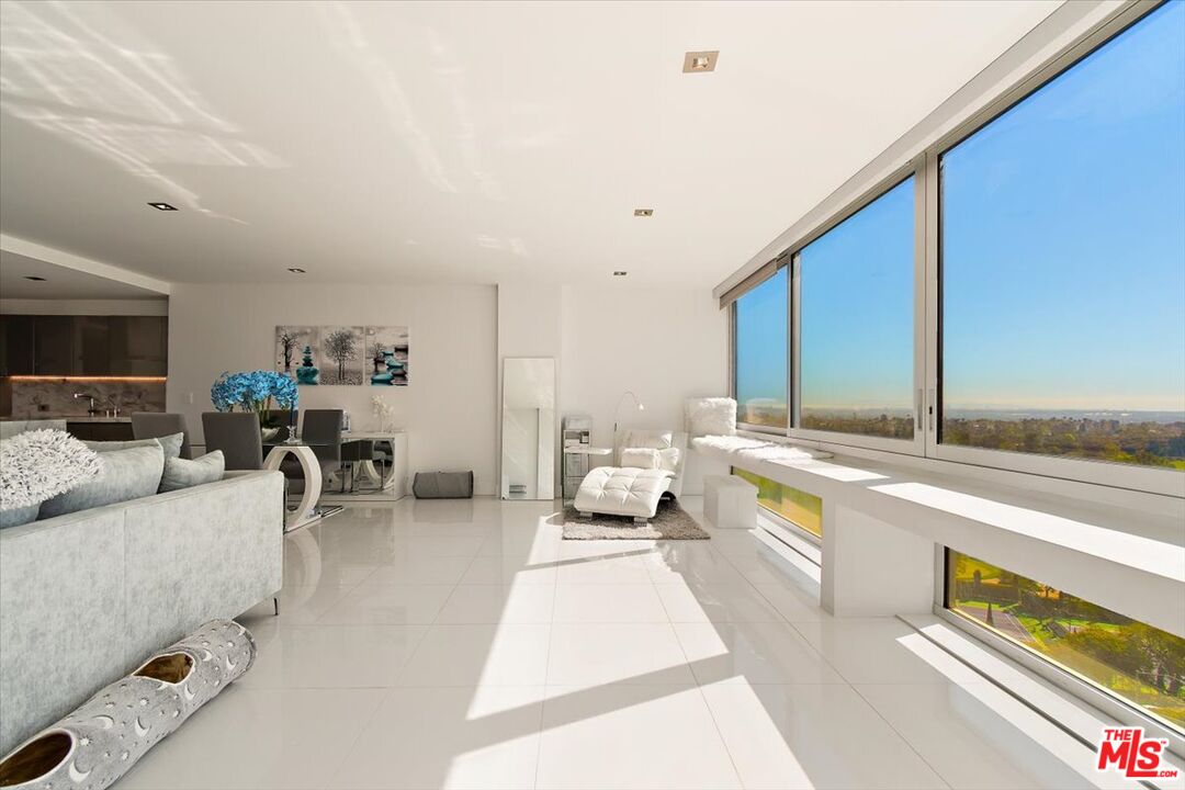 2222 Avenue Of The Stars, Unit 1203 Los Angeles, CA 90067 - Photo 7 of 43 a large living room with a large window