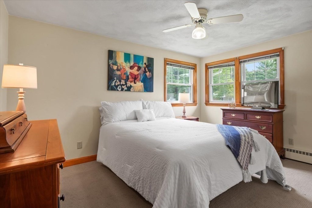 23 Old Post Road East Walpole, MA 02032 - Photo 17 of 27 a bedroom with a bed and a large window